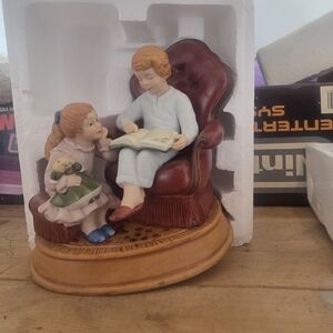 Avon Holiday Figurine with Burgundy and Blue Accents